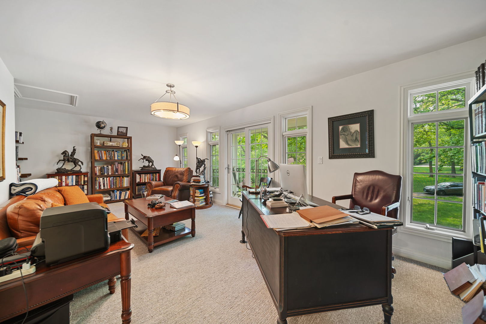 7-n751 Sayer Road Bartlett, IL 60103 - Photo 18 of 30 a living room with furniture fireplace and large windows