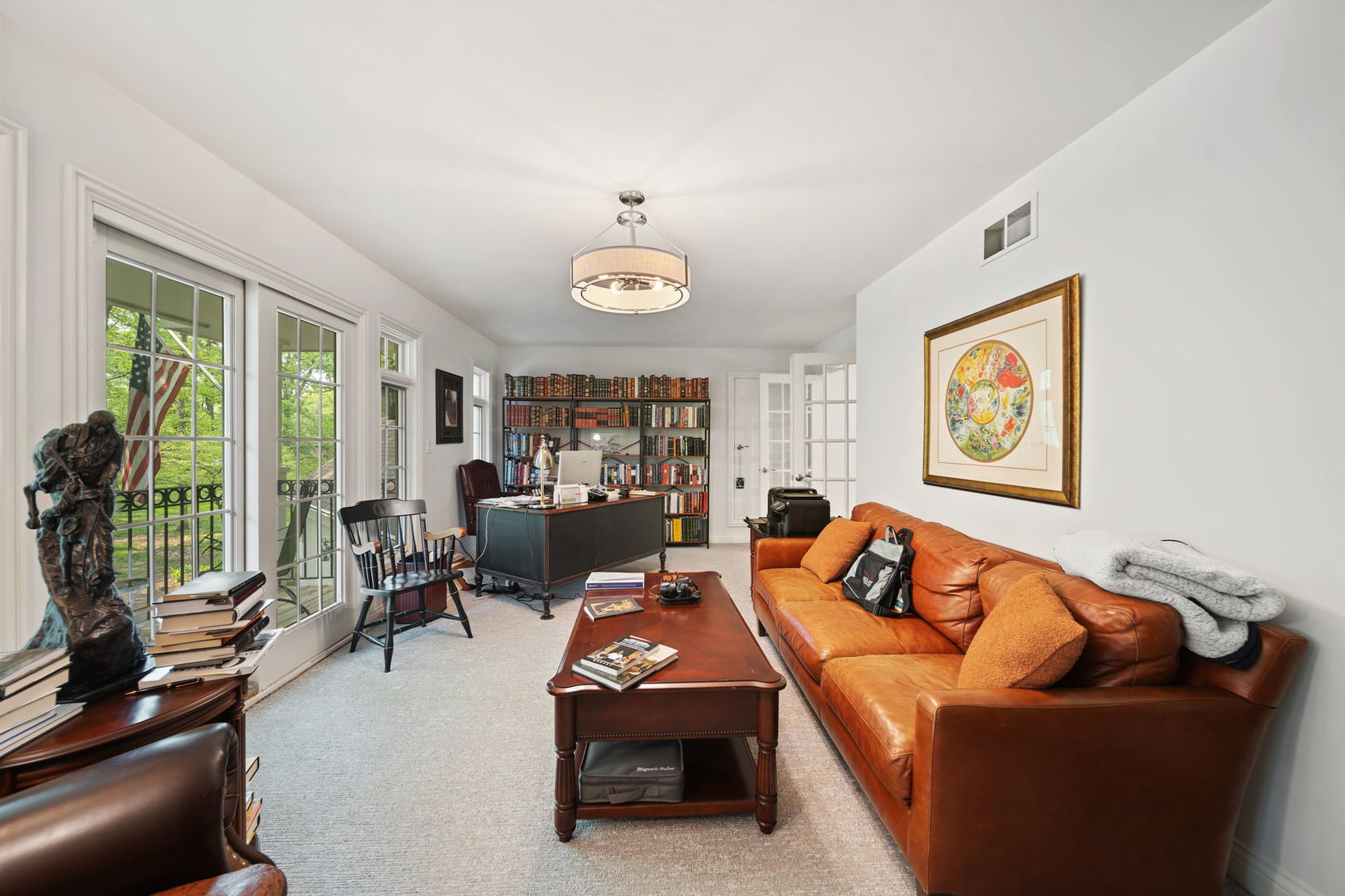 7-n751 Sayer Road Bartlett, IL 60103 - Photo 19 of 30 a living room with furniture and a flat screen tv