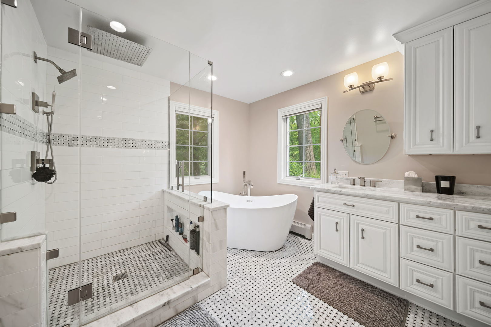 7-n751 Sayer Road Bartlett, IL 60103 - Photo 22 of 30 a bathroom with a double vanity sink a toilet a mirror and shower