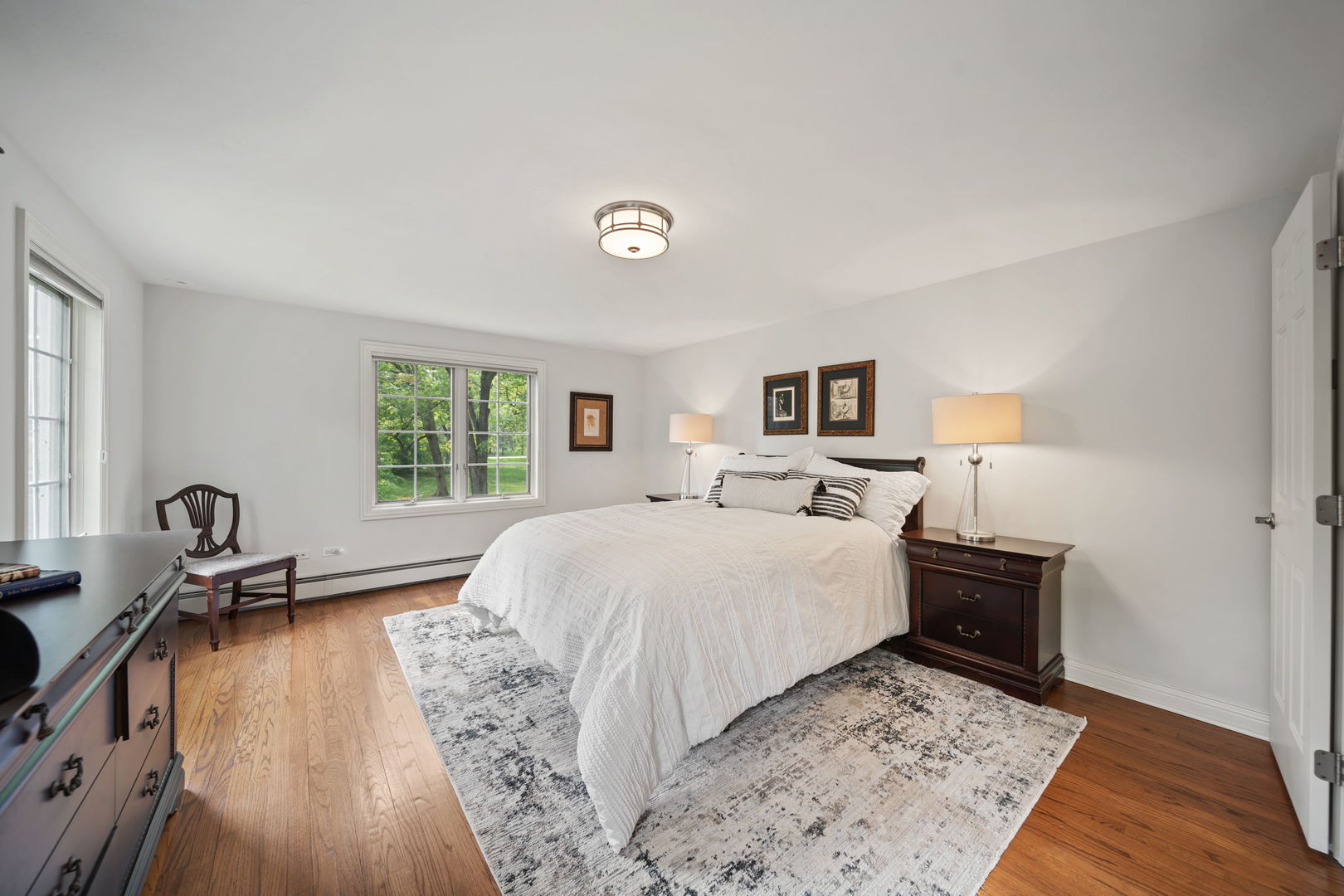 7-n751 Sayer Road Bartlett, IL 60103 - Photo 23 of 30 a bed room with a bed and a tv