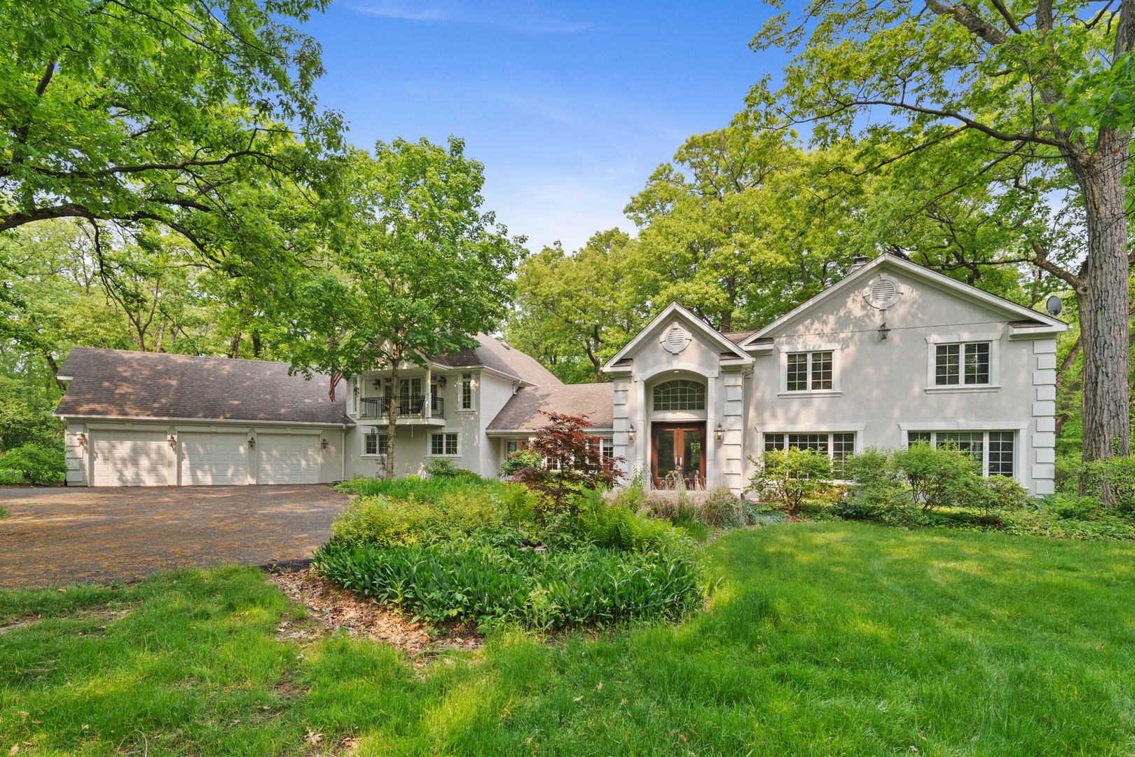 7-n751 Sayer Road Bartlett, IL 60103 - Photo 30 of 30 a front view of a house with a yard and trees