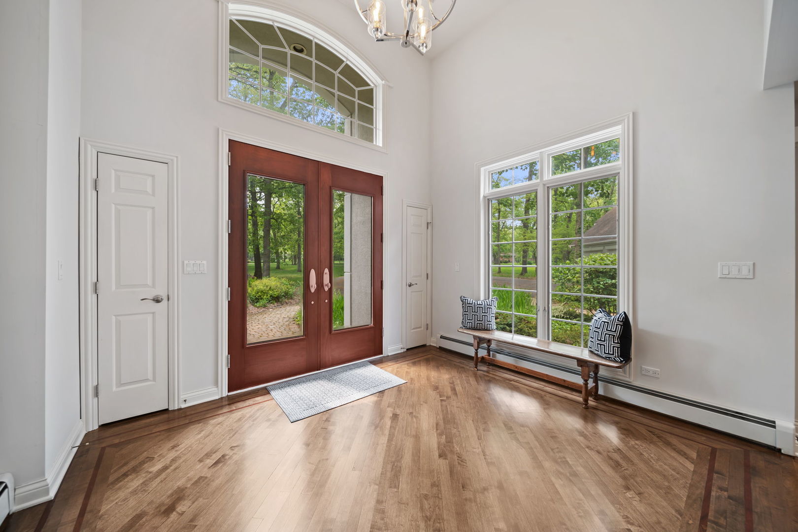 7-n751 Sayer Road Bartlett, IL 60103 - Photo 5 of 30 a view of an empty room with a window and wooden floor