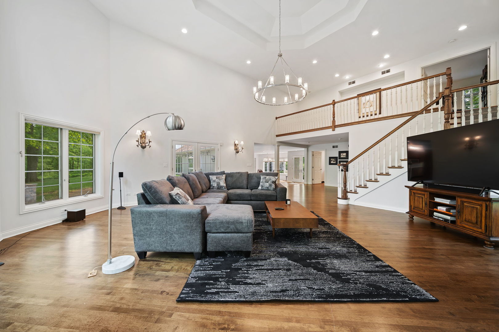 7-n751 Sayer Road Bartlett, IL 60103 - Photo 10 of 30 a living room with furniture and a flat screen tv