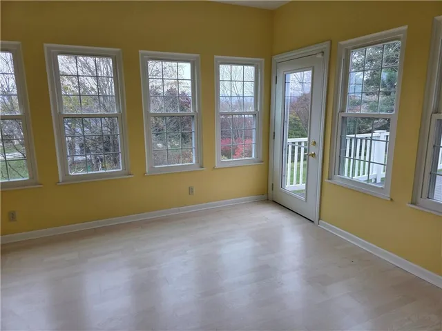 an empty room with windows