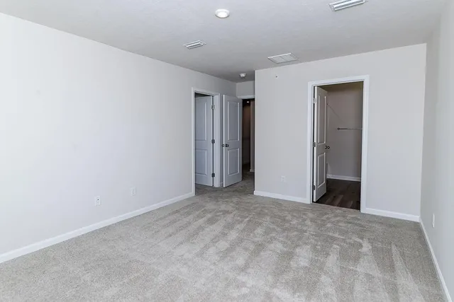 a bathroom with a sink toilet and vanity