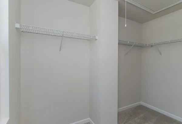 a bathroom with a toilet and a bathtub