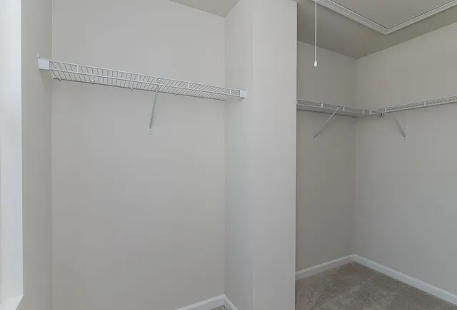 a bathroom with a toilet and a bathtub