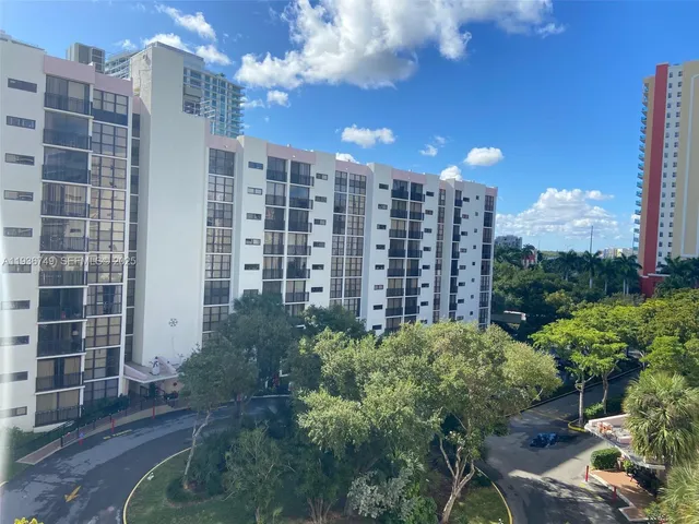 a view of a city with tall buildings