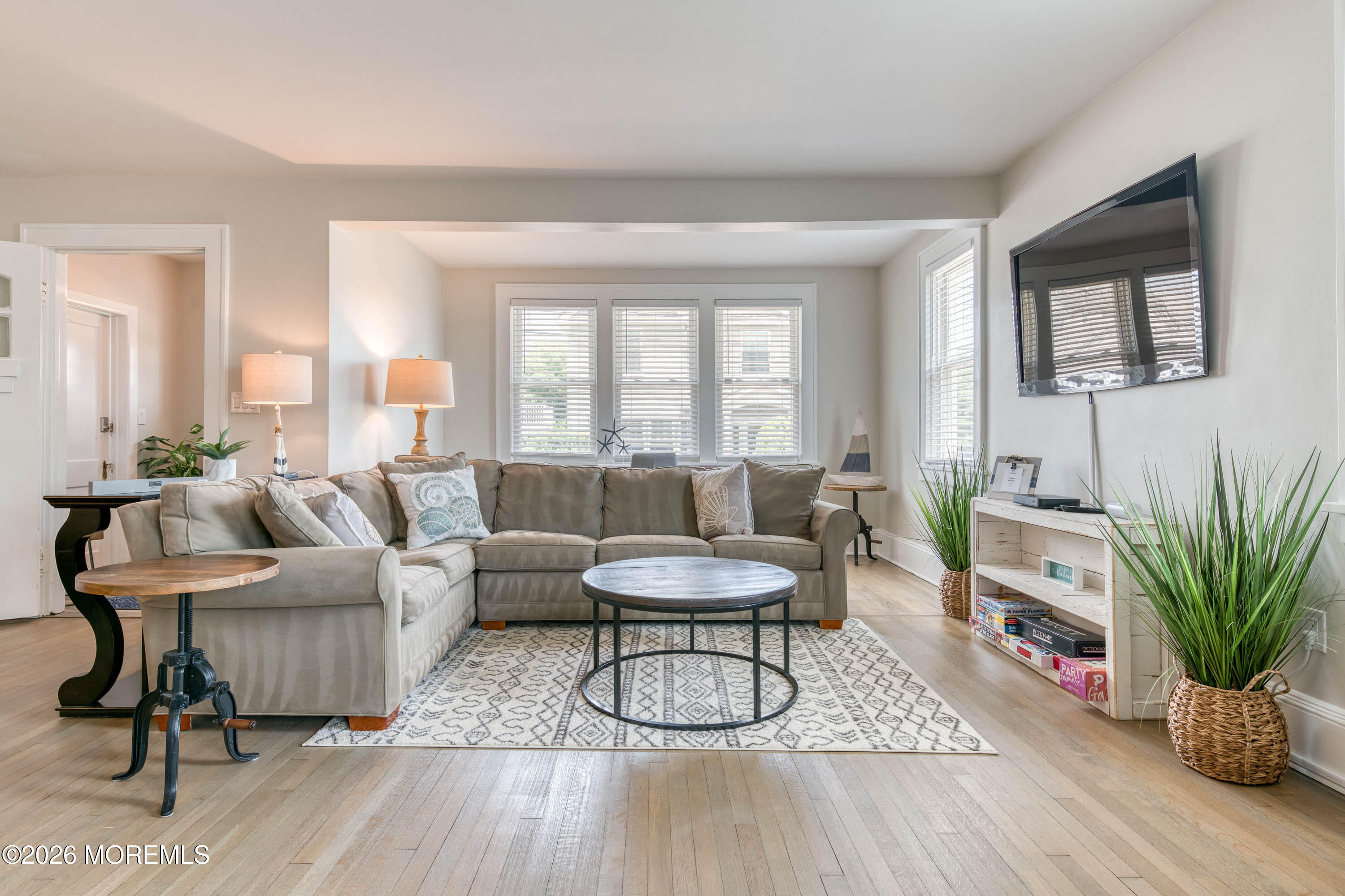 2 Via Ripa, Unit 1 Sea Bright, NJ 07760 - Photo 15 of 38 a living room with furniture and a wooden floor