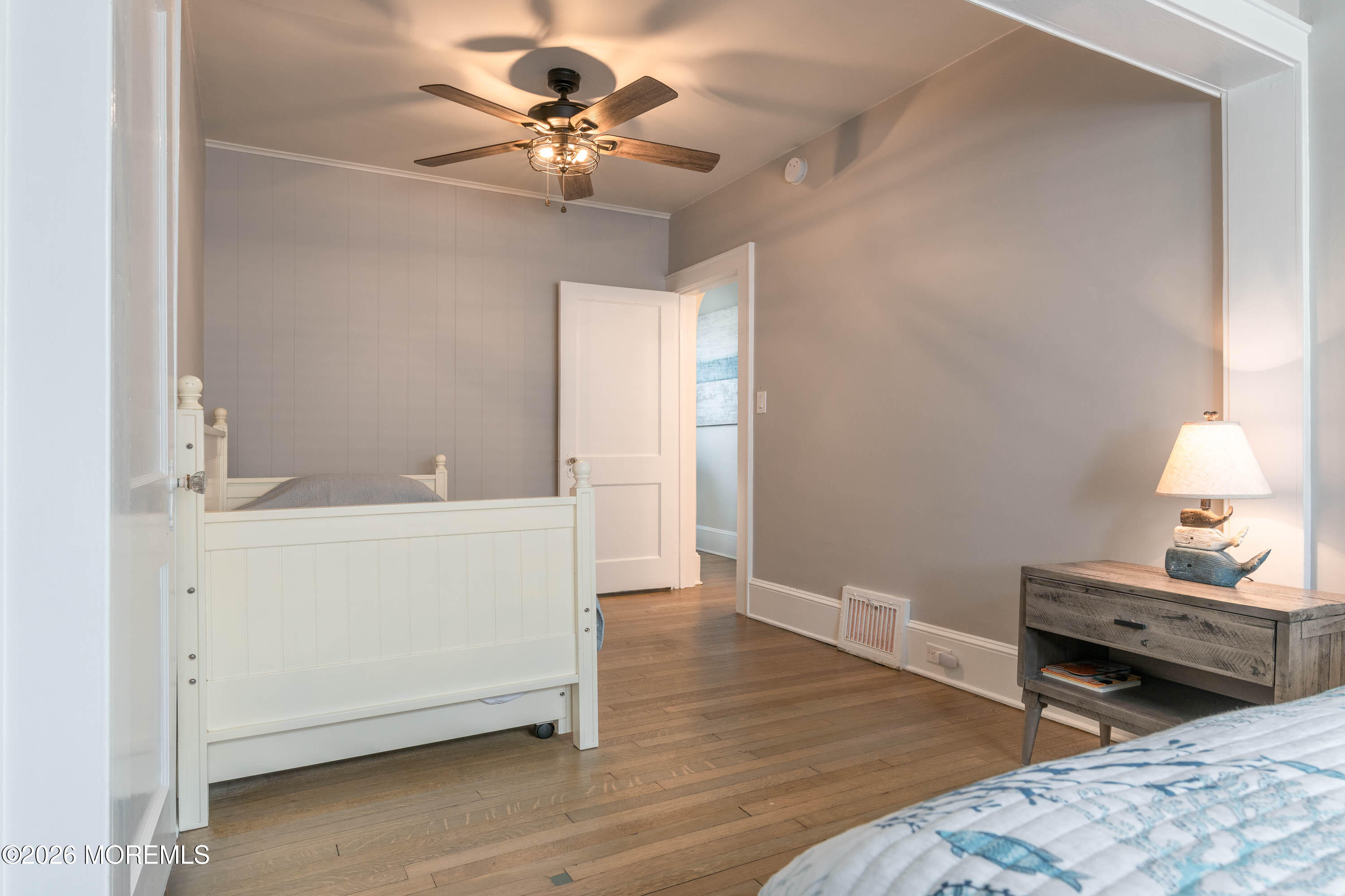 2 Via Ripa, Unit 1 Sea Bright, NJ 07760 - Photo 23 of 38 a living room with furniture and a chandelier