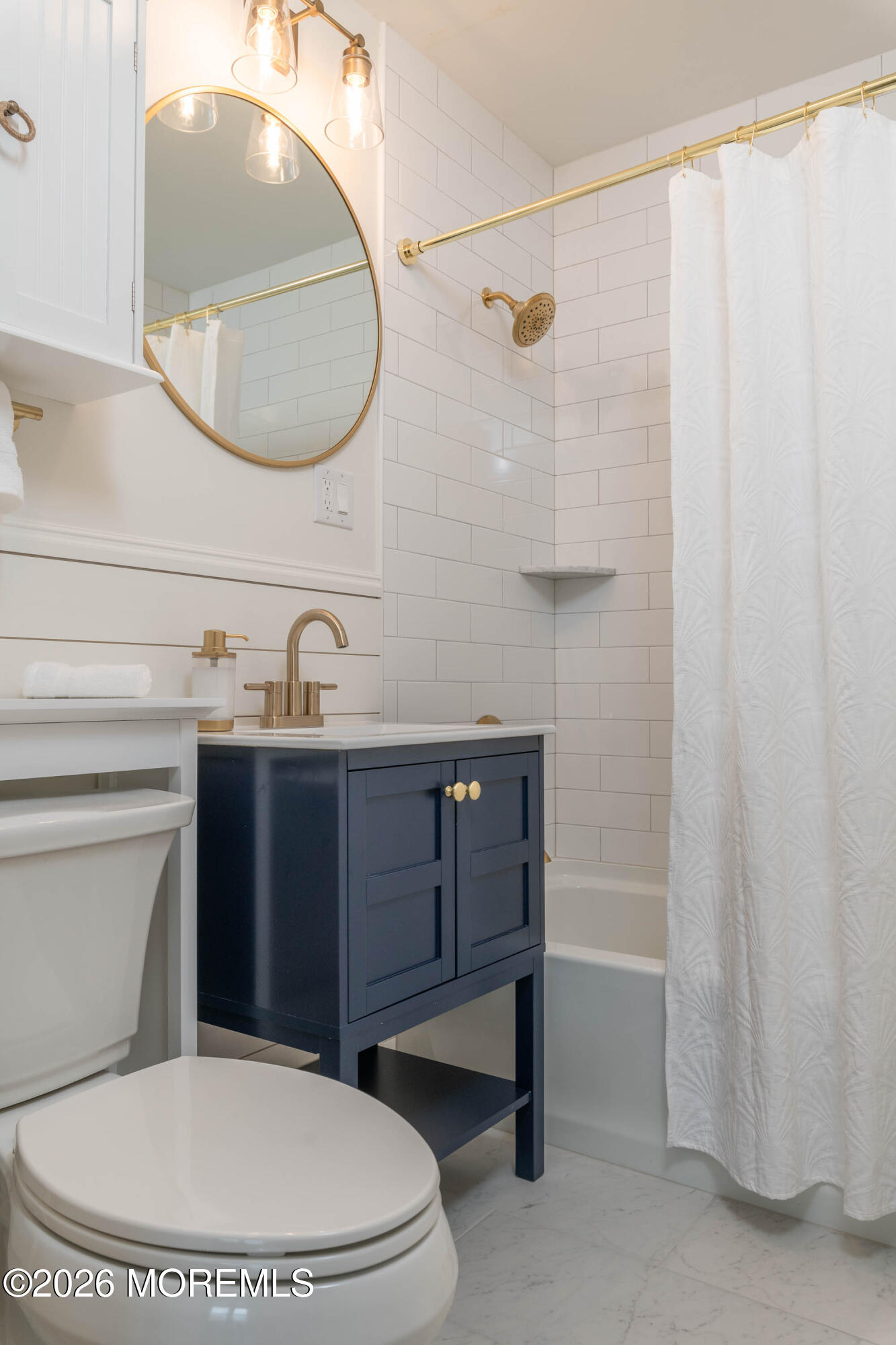 2 Via Ripa, Unit 1 Sea Bright, NJ 07760 - Photo 6 of 38 a bathroom with a toilet a sink and bathtub