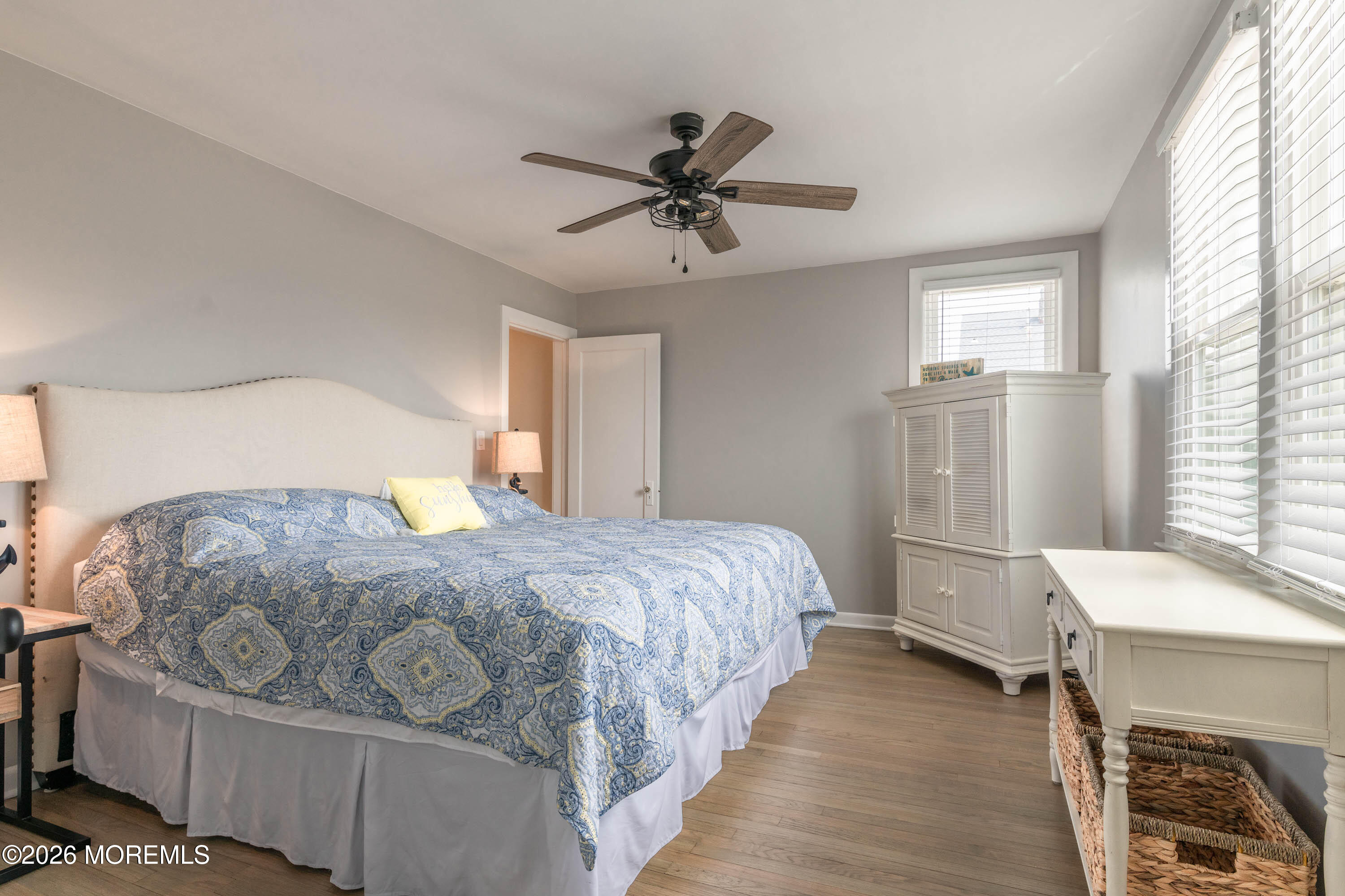 2 Via Ripa, Unit 1 Sea Bright, NJ 07760 - Photo 9 of 38 a bedroom with a bed and wooden floor