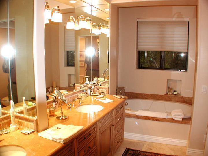 92 Seaview Drive Montecito, CA 93108 - Photo 17 of 27 a bathroom with a tub sink and mirror