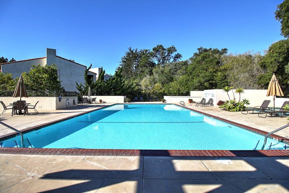 92 Seaview Drive Montecito, CA 93108 - Photo 25 of 27 a view of a tennis court with potted plants