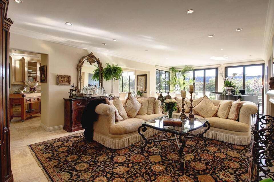 92 Seaview Drive Montecito, CA 93108 - Photo 5 of 27 a living room with furniture potted plant and a large window
