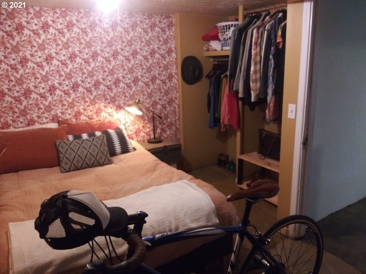 315 North 1st Avenue Ridgefield, WA 98642 - Photo 11 of 17 a bedroom with a bed and a closet