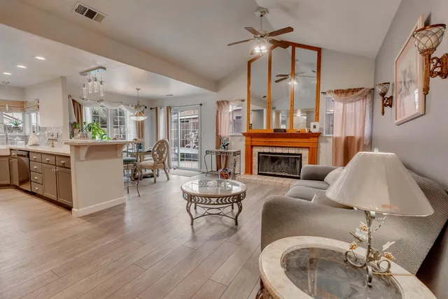 a bathroom with a granite countertop sink mirror and