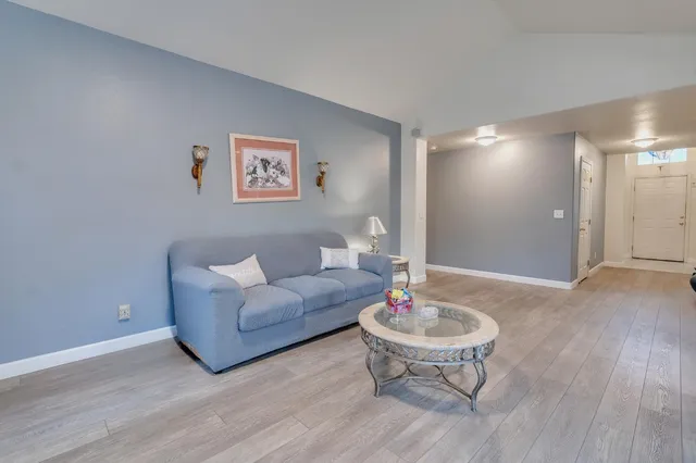 a front view of a house with outdoor seating