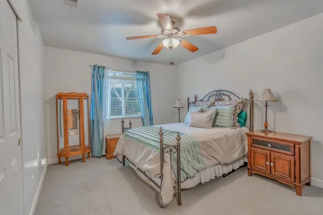 a view of a lake with a house in the background