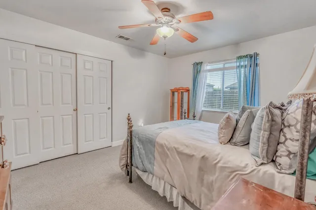 a view of a water fountain in front of the house