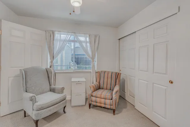 a view of a house with outdoor space and a garden