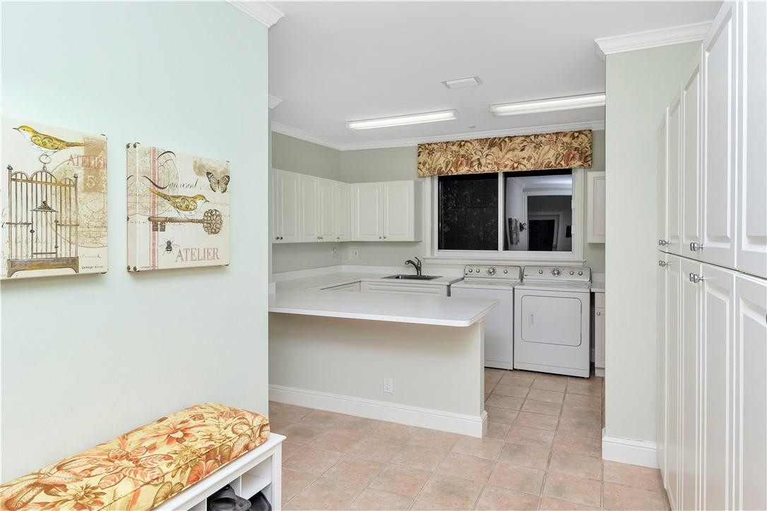 431 East Coconut Palm Road Boca Raton, FL 33432 - Photo 33 of 43 OVERSIZED UTILITY ROOM