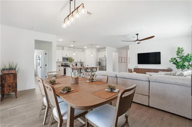 a view of a dining room with furniture