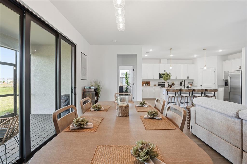 20428 Verawood Loop Estero, FL 33928 - Photo 15 of 50 Dining room featuring recessed lighting