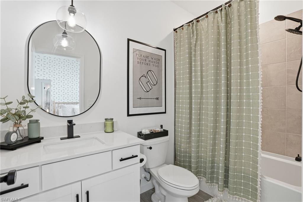 20428 Verawood Loop Estero, FL 33928 - Photo 23 of 50 Bathroom with vanity and shower / tub combo