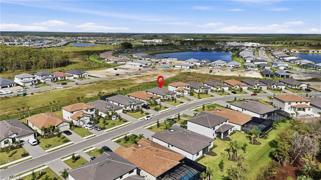 20428 Verawood Loop Estero, FL 33928 - Photo 38 of 50 View of property location with a large body of water and nearby suburban area