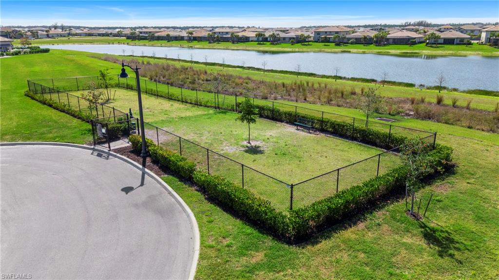 20428 Verawood Loop Estero, FL 33928 - Photo 45 of 50 Aerial perspective of suburban area featuring a large body of water