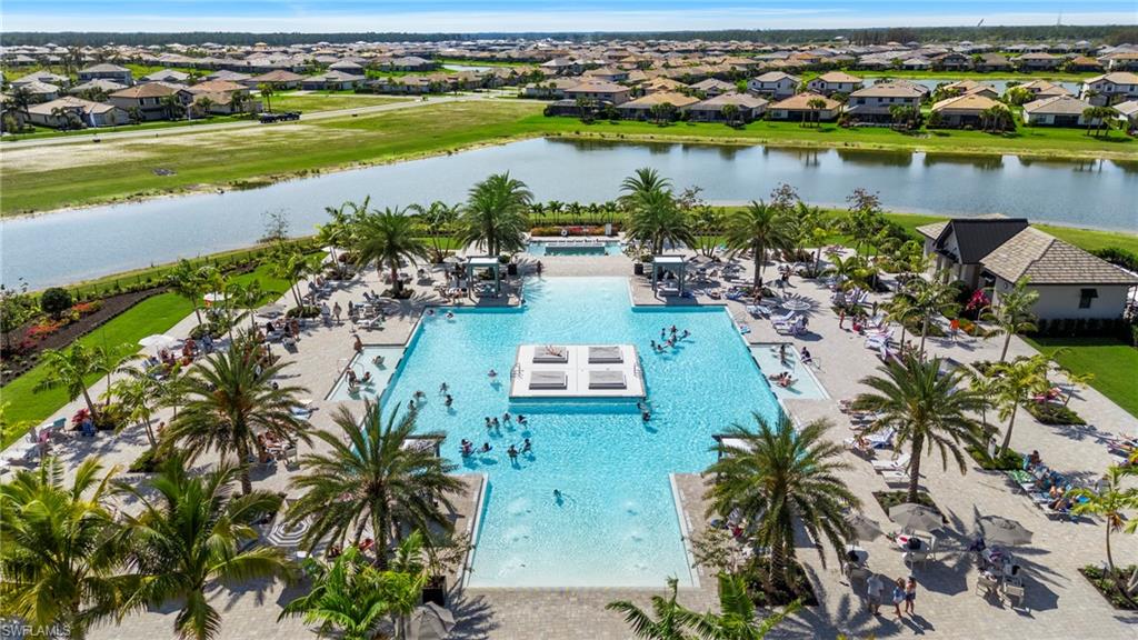 20428 Verawood Loop Estero, FL 33928 - Photo 47 of 50 Aerial view of residential area with a nearby body of water and a pool area