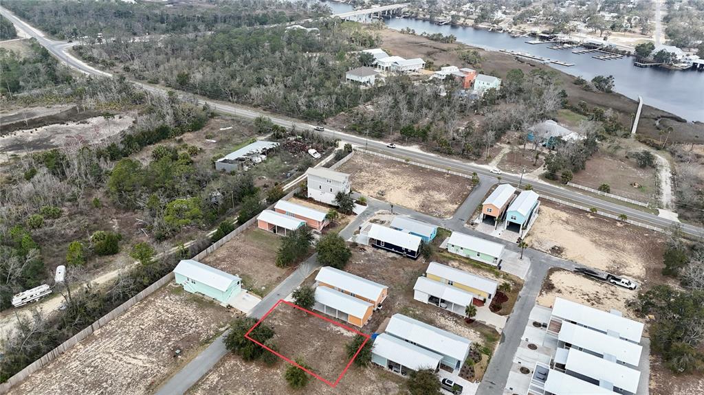 Tbd Southwest Tbd Sw 879th Street Steinhatchee, FL 32359 - Photo 1 of 17 an aerial view of a house with a yard