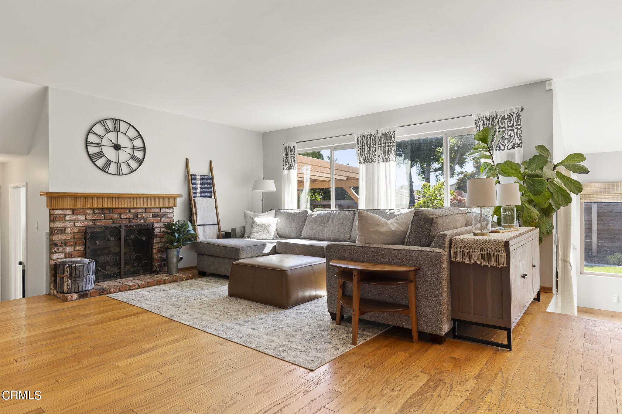 320 Fallen Leaf Avenue Camarillo, CA 93012 - Photo 14 of 49 a living room with furniture and a fireplace