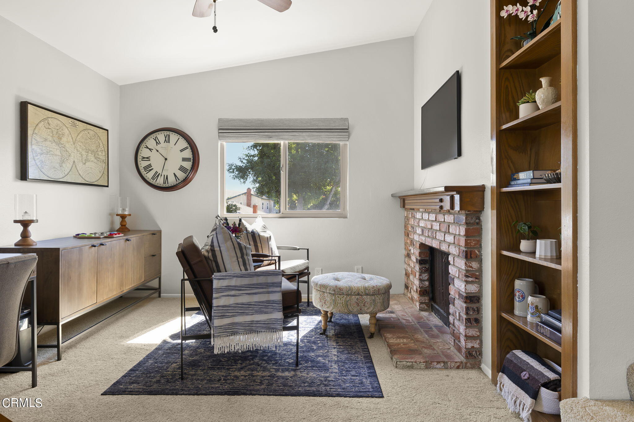 320 Fallen Leaf Avenue Camarillo, CA 93012 - Photo 20 of 49 a living room with furniture a rug and a window