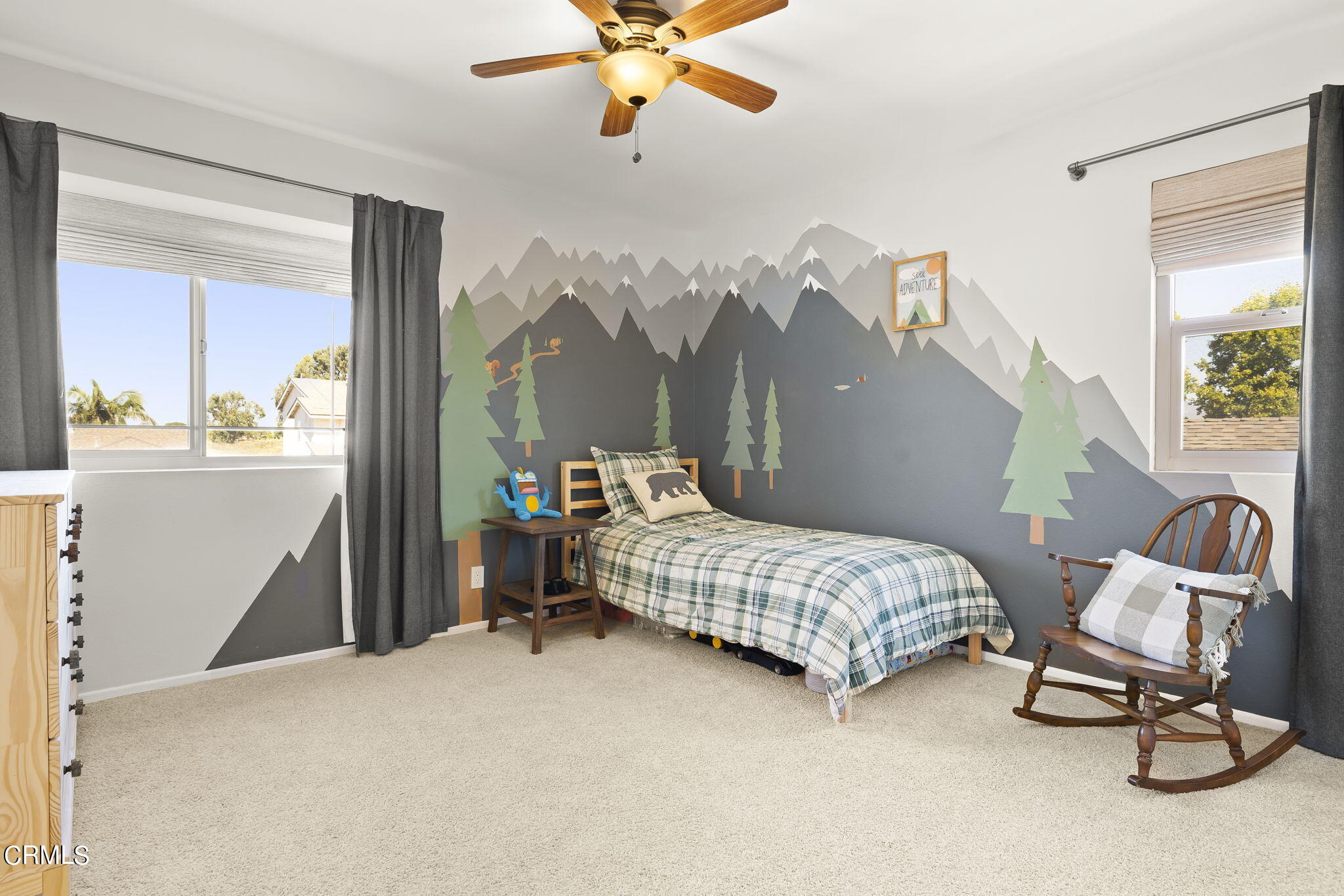 320 Fallen Leaf Avenue Camarillo, CA 93012 - Photo 27 of 49 a bedroom with a bed and a chandelier