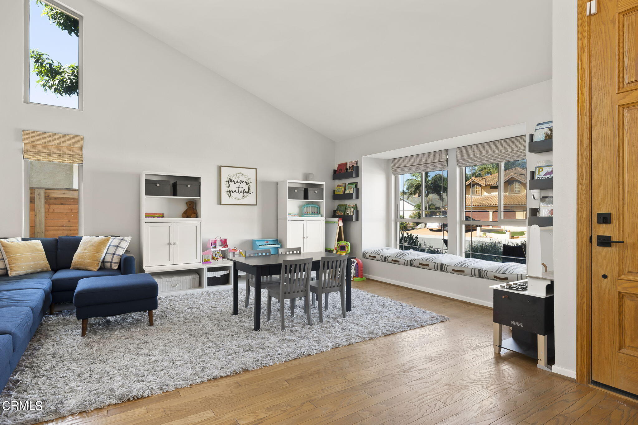 320 Fallen Leaf Avenue Camarillo, CA 93012 - Photo 4 of 49 a living room with furniture wooden floor and a large window