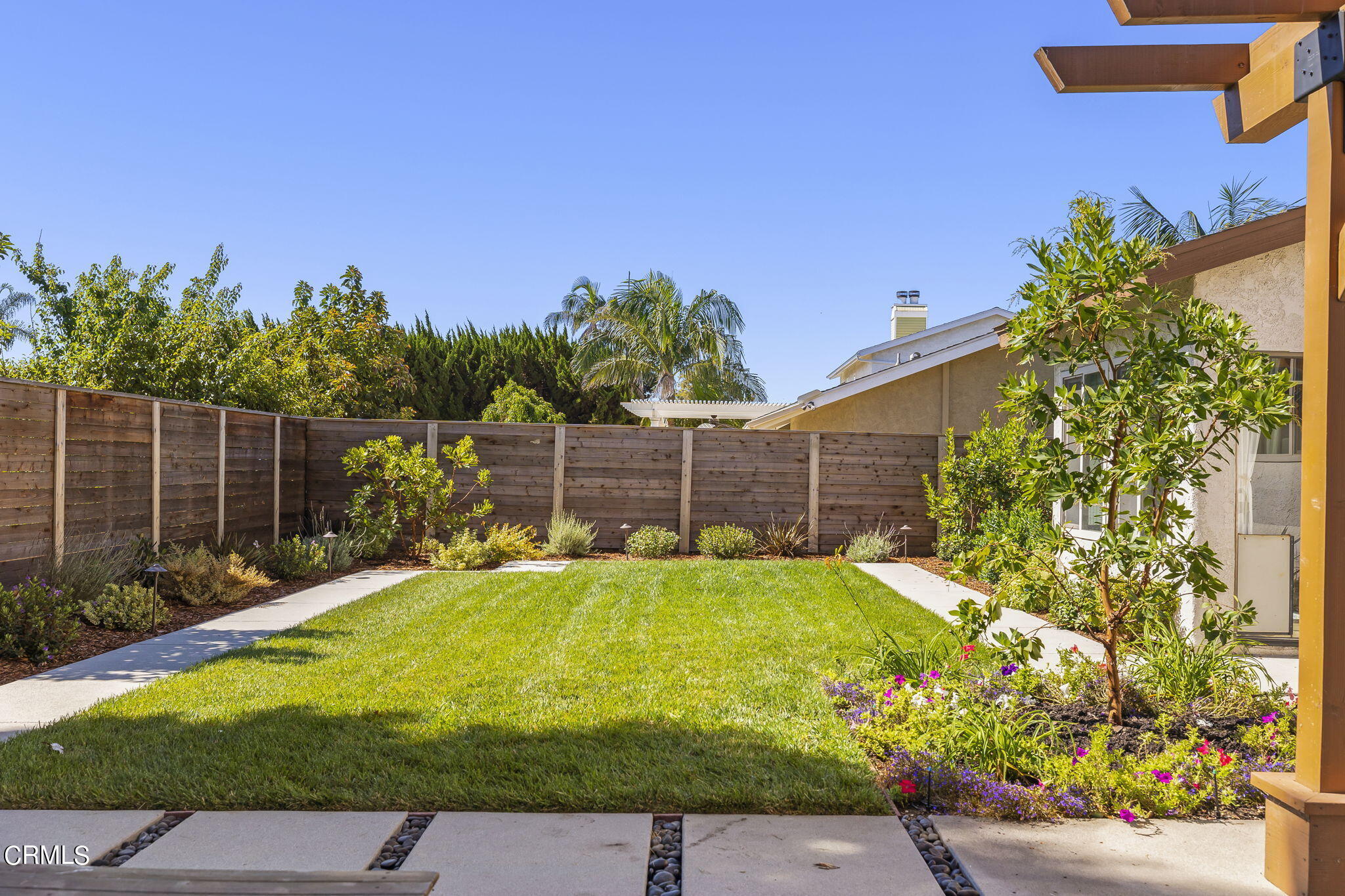 320 Fallen Leaf Avenue Camarillo, CA 93012 - Photo 41 of 49 a view of a backyard with plants and a patio