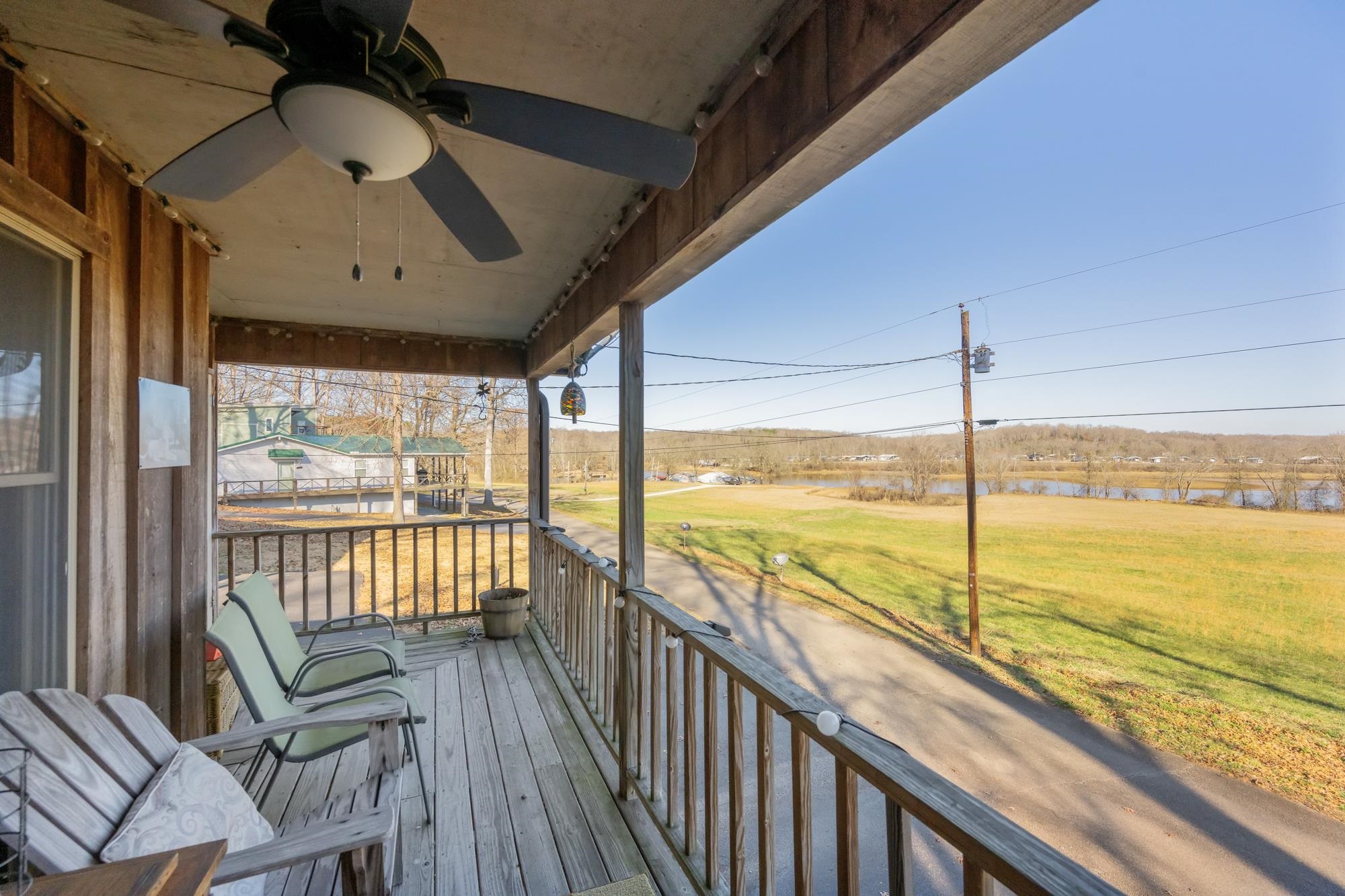 982 Lost Creek Boat Dock Road Decaturville, TN 38329 - Photo 6 of 31 a view of a balcony with ocean view