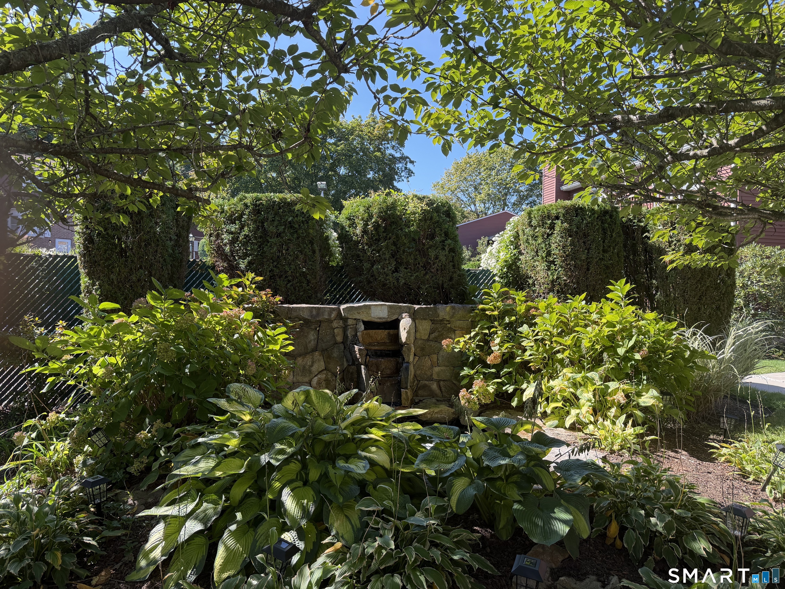 41 Patricia Road, Unit D Bridgeport, CT 06606 - Photo 22 of 25 Fairfield Village Community Waterfall Garden