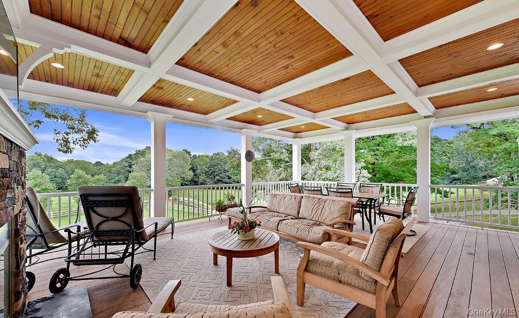 29 Gracemere Tarrytown, NY 10591 - Photo 14 of 16 a view of a patio with chairs and wooden floor