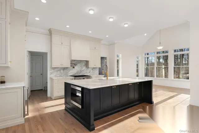 a kitchen with a stove and a sink
