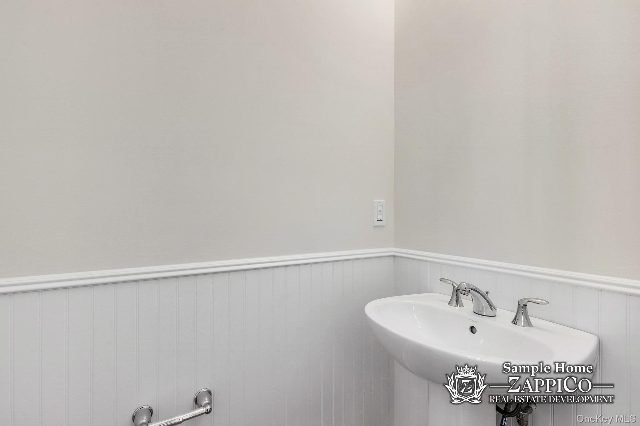 29 Gracemere Tarrytown, NY 10591 - Photo 8 of 16 a bathroom with a sink and a mirror