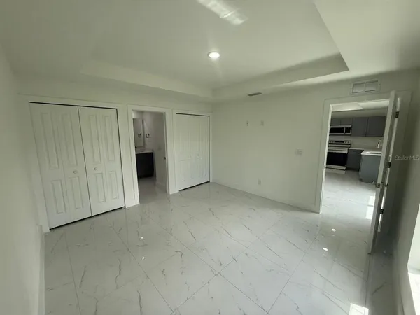 an empty room with a bathroom