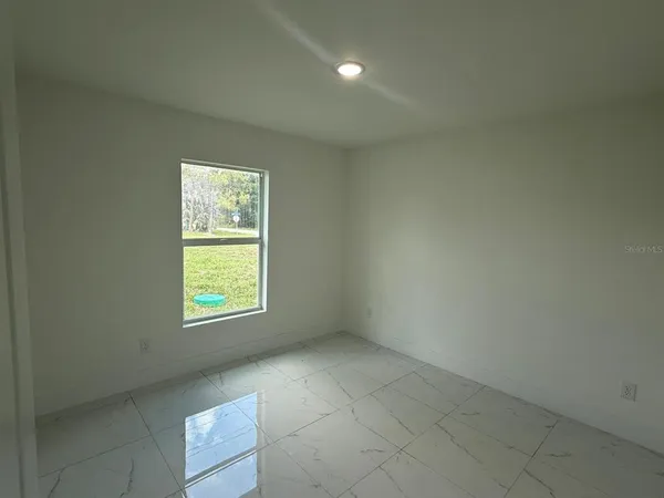 an empty room with a window