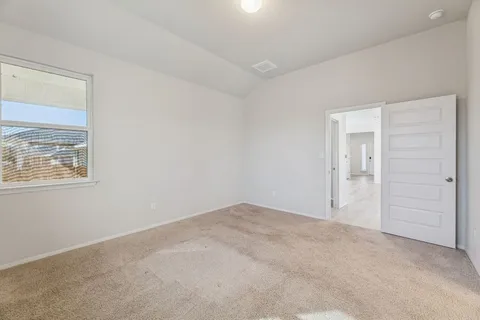 a view of kitchen with wooden floor and electronic appliances