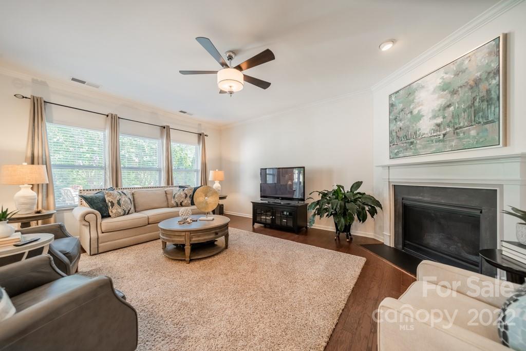 86640 Arrington Road Lancaster, SC 29720 - Photo 3 of 25 a living room with furniture a fireplace and a large window
