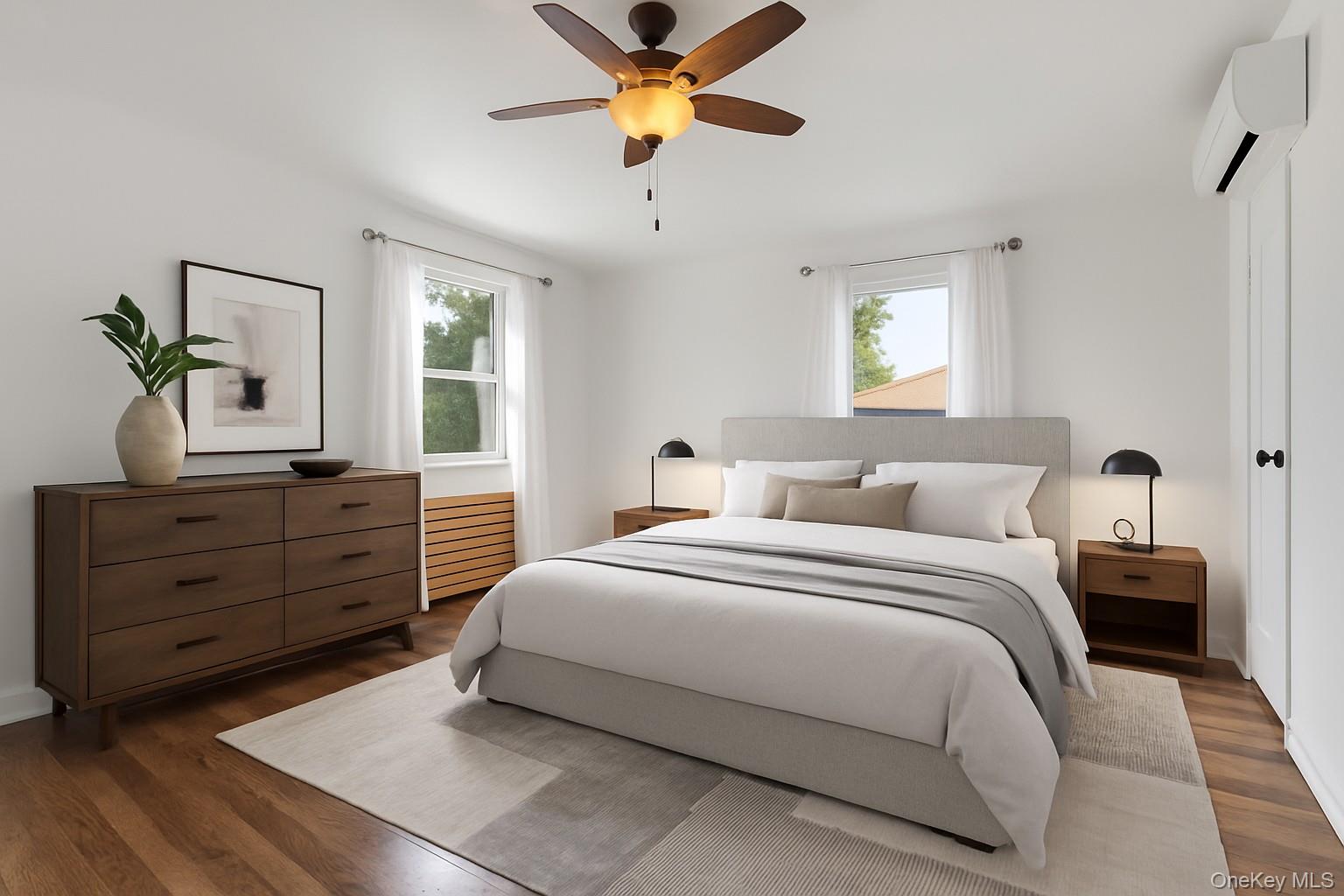 79-31 211th Street Queens, NY 11364 - Photo 14 of 28 Bedroom with wood finished floors, a ceiling fan, and a wall unit AC