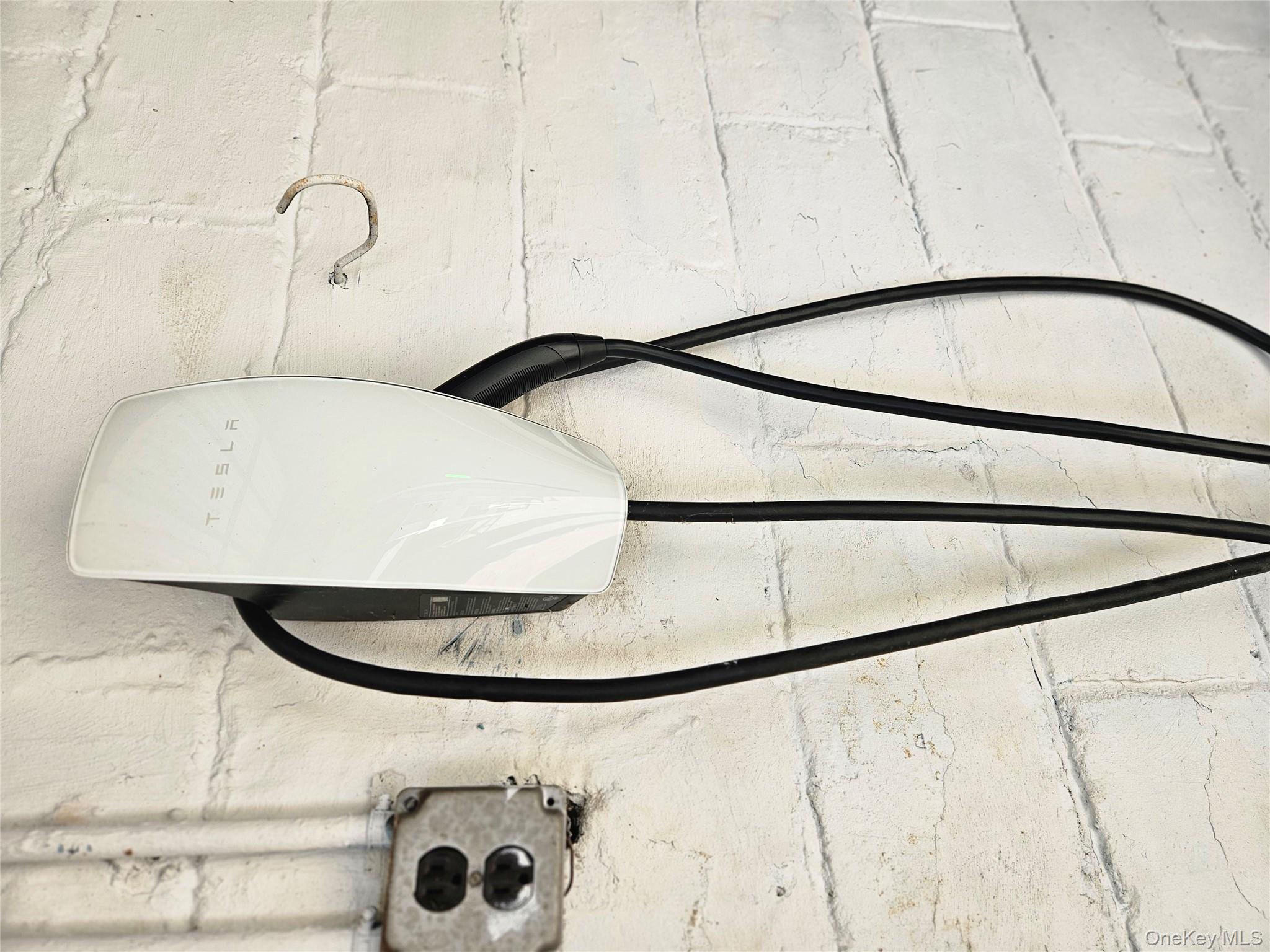 79-31 211th Street Queens, NY 11364 - Photo 28 of 28 Garage view of electric vehicle charger