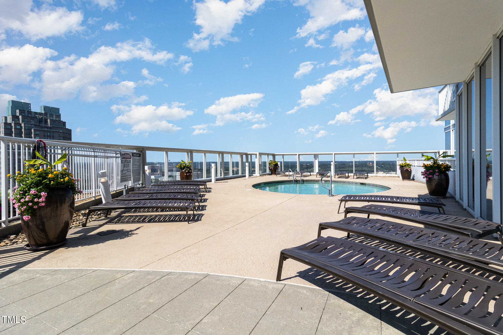 301 Fayetteville Street, Unit 2701 Raleigh, NC 27601 - Photo 22 of 26 a view of a balcony with chairs